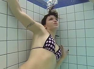 Teens have Fun under Water.