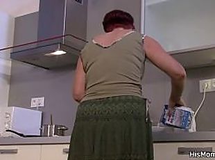 Mom and girl lesbian action in the kitchen